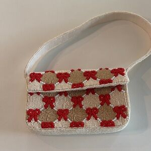 Anthropologie Elegant Beaded Shoulder Bag with Red bow Accents
